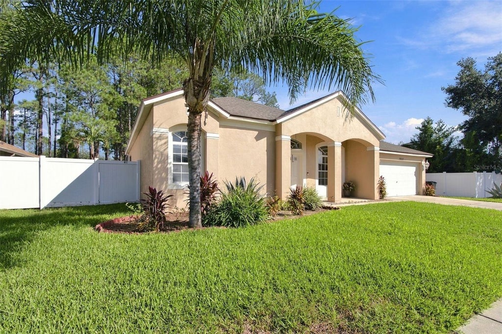 Photo of 20827 Woodvale Lane, Land O Lakes, FL 34638 (MLS # TB8560275)