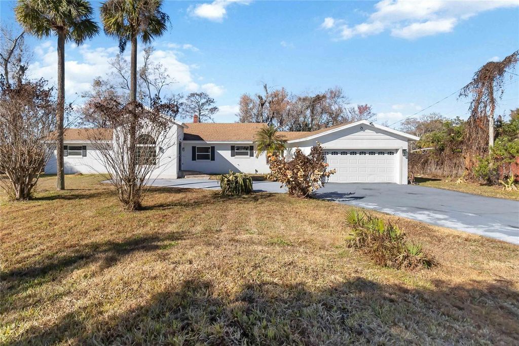 Photo of 4014 Heatherington Road, Orlando, FL 32808 (MLS # R4910703)