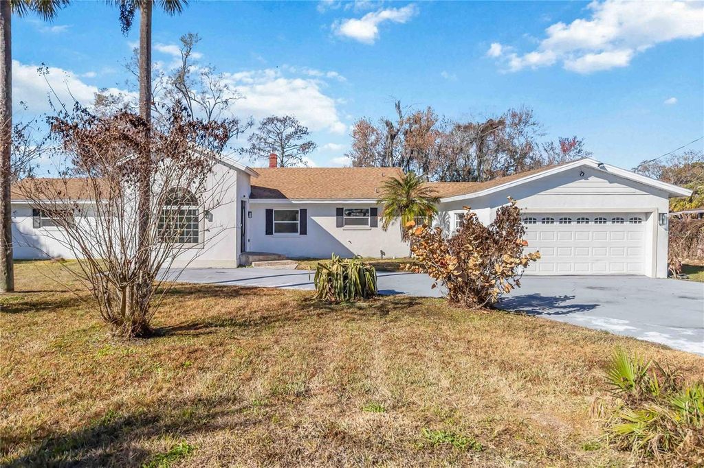 Photo of 4014 Heatherington Road, Orlando, FL 32808 (MLS # R4910703)