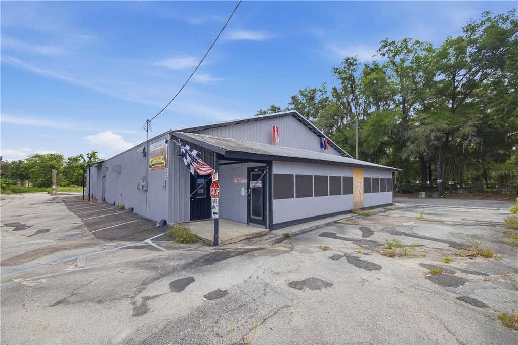 Photo of 609 NW 4th Avenue #C, Ocala, FL 34475 (MLS # OM727227)