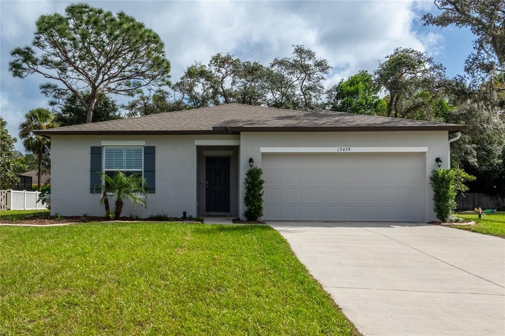 Photo of 13459 Banyan Road, Spring Hill, FL 34609 (MLS # TB8561866)