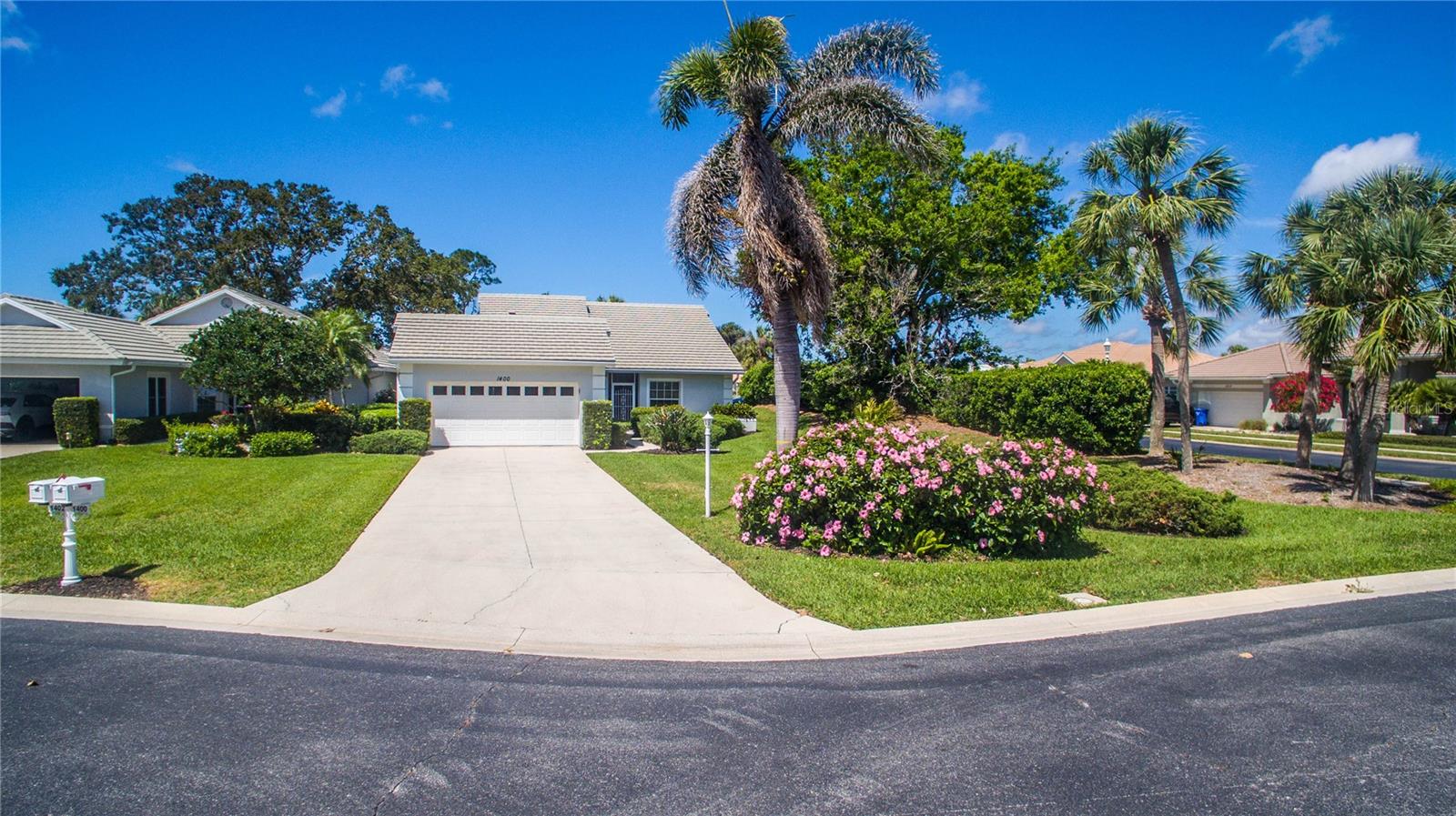 TURN KEY! With possible " attractive financing" Welcome to "The Colony Place," a charming, exclusive community of just 36 homes within the highly sought-after "Waterford" a Championship Golf and Tennis Community. This impeccably landscaped home is just steps away from the community heated pool, which is exclusively for the residents. The extra-long driveway provides ample space for plenty of parking. As you enter you will fall in love with the Open floor plan, this 2/2 bath home plus DEN with French doors, and real hardwood flooring, offers a 55 inch TV with surround sound. The living/dining room flows nicely into a lovely enclosed 4 seasons room that brings plenty of sunshine through out the entire home, as well as providing plenty of extra space for entertaining. Living room includes an 86in TV with surround sound. The modern kitchen features, quarts counter-tops, THOMASVILLE, soft close wood cabinets with pull outs, deep double sinks, stainless steel appliances, pantry and a quarts counter top BAR.
The Master bedroom, with its private en-suite has been totally renovated to include, a hybrid walk-in tub, great for bathing, relaxing and soothing your body. Marble double sinks, As well as a separate walk in shower with wall to wall seat. The 18x9 size walk in closet is a dream come true. Its the size of a room. The guest bedroom in front of the house offers plenty of light as well as a fully remodeled bathroom, a Roman glass shower with floor to ceiling tile and a quarts counter top vanity.
A 2 car garage with A/C features work bench and flooring in the attic.
After touring this lovely home, make sure to visit the Clubhouse where you can enjoy world-class amenities, such as a Heated Pool & Spa, Tennis Courts, a Fitness Center, and Restaurant. The semi-private Golf Club for an optional fee you can enjoy a top-tier 27-hole golf coarse with driving range that also includes use of the other local golf courses such as the Turnberry, Gleneagles, or Sawgrass courses. This Community, is conveniently located within 3 miles of downtown Venice with lots of shopping, dining, and entertainment as well as the Well known historic Venice Theatre. 4 miles to the Gulf of Mexico with its pristine beaches, as well as easy access to 1-75 for quick travel north or south. Be sure to add this one to your list!! (Once a year fee of $2208.00 for the use of Waterford Clubhouse is mandatory and paid in the beginning of the year) Seller says bring all offers !!!