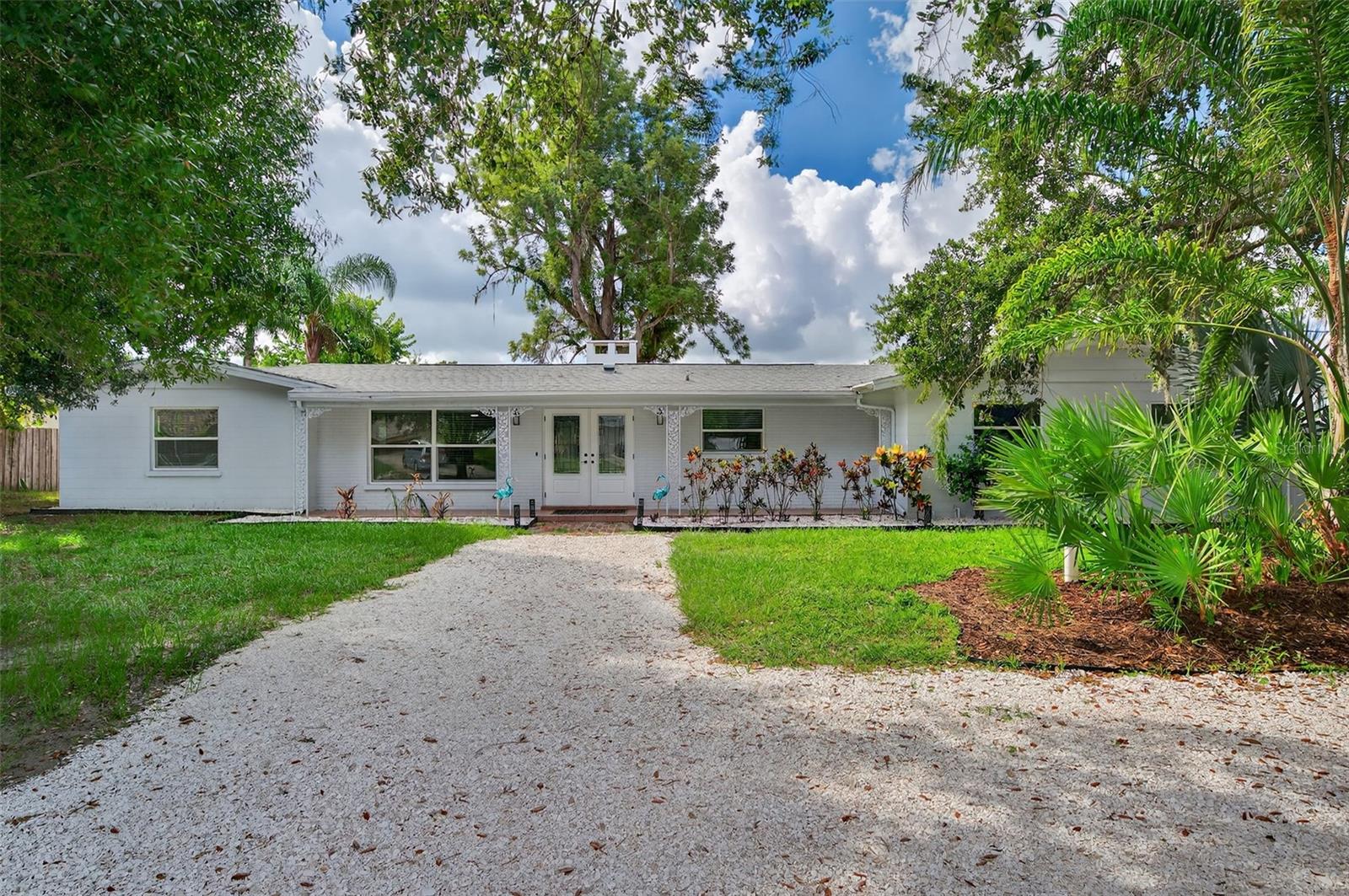 This beautifully renovated home sits on a rare 0.56-acre corner lot in the desirable Sherwood Estates community. With no HOA, a prime Sarasota location, and nearly every major upgrade complete, it’s truly move-in ready and offers exceptional peace of mind.
Recent updates include a newer roof (2023), new A/C, updated plumbing rerouted through the attic, new electrical wiring and outlets, new attic insulation, a new water heater, water softener, water purifier, water pump, and a new garage door.
Inside, the remodeled kitchen showcases quartz countertops, stainless steel appliances, a spacious island, and a dry bar with a beverage refrigerator. Both bathrooms have been updated, and new tile flooring complements the functional split floor plan. A cozy wood-burning fireplace adds warmth and charm.
Outdoors, the property offers a true retreat with a serene lake view, a new dock, and abundant fishing opportunities. A rare built-in grill with proper ventilation enhances outdoor living, while a majestic 200-year-old cedar tree and mature live oak add natural beauty and shade. There’s also ample space for boat or RV parking.
The oversized two-car garage provides excellent storage, and the primary suite features a walk-in closet.
Sherwood Estates delivers unmatched convenience - just minutes to I-75, downtown Sarasota, shopping, dining, and the UTC Mall.
Blending modern upgrades with timeless natural beauty, this home is a unique opportunity in Sarasota. Schedule your private showing today!
Some photos have been virtually staged