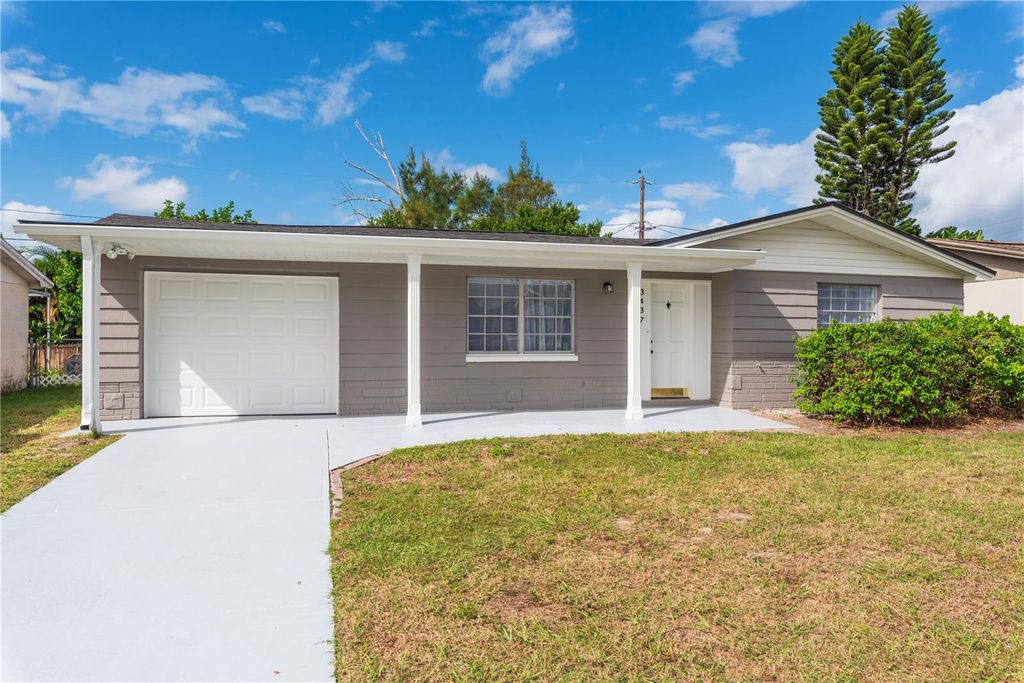 Photo of 3437 Wiltshire Drive, Holiday, FL 34691 (MLS # TB8443918)