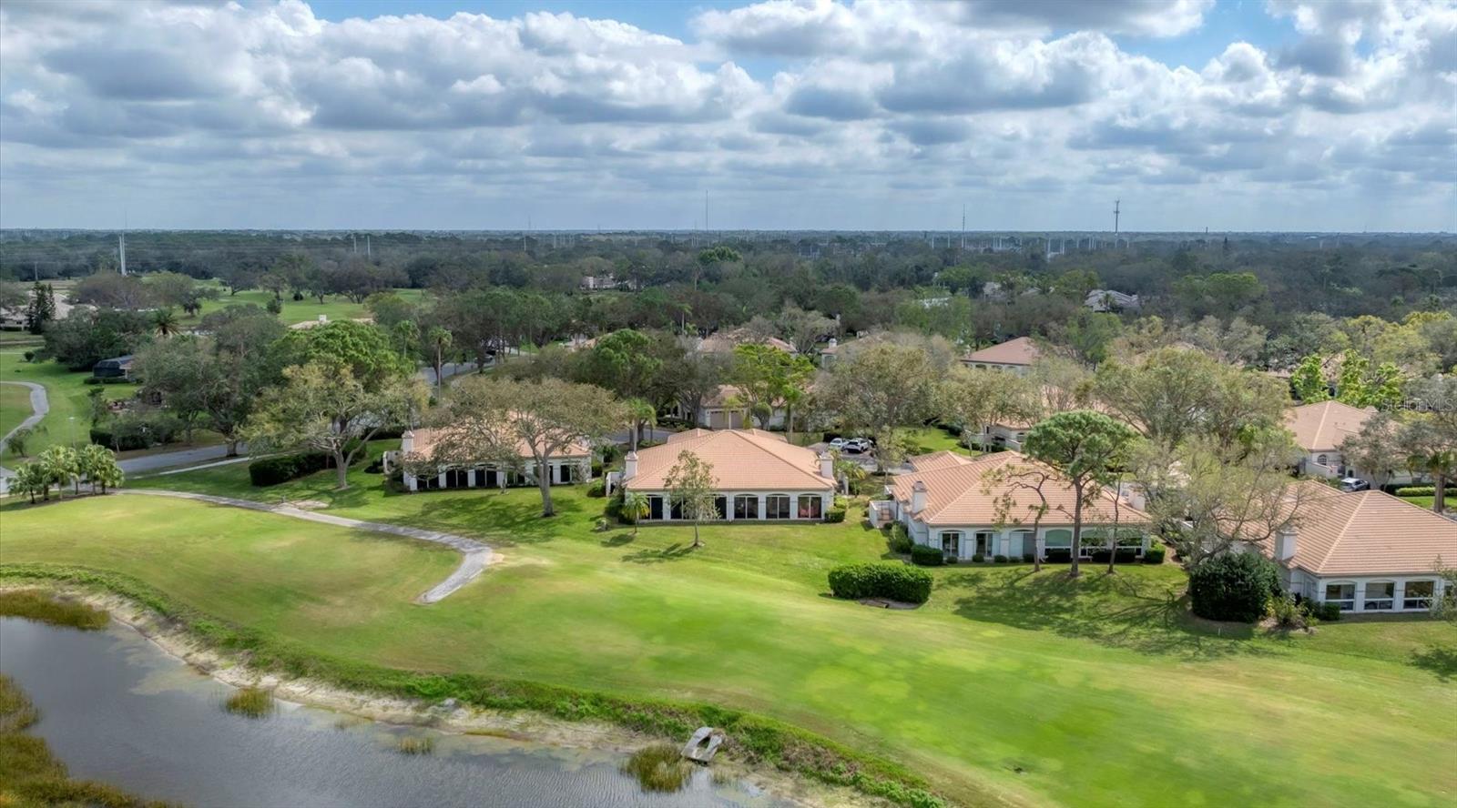 Stunning golf course retreat in The Meadows' most-desirable enclave! Immaculate, sophisticated and offering breathtaking golf course views, this exquisite villa is in the Highlands section of The Meadows, a tranquil oasis just 15 minutes from downtown. From the moment you step onto the charming travertine courtyard, you'll sense the exceptional craftsmanship and thoughtful details that make this residence special. Inside, a gleaming hardwood foyer welcomes you into an open airy space, where high crown-molded ceilings and a tray ceiling in the great room enhance a sense of elegance. A Florida room with walls of sliders showcases the mesmerizing, panoramic views of the golf course. The beautifully appointed kitchen features white cabinetry, Royal Crème granite countertops, an island with breakfast bar and ready access to the grilling patio. You will find it easy to love the primary suite with walk-in closet and an ample spa-inspired bath with dual granite vanity and gorgeous frameless Roman shower dual shower heads. All featuring an ideal layout with space and privacy for all, a block to the heated pool and spa and a short ride to all the fun The Meadows has to offer. A five-star location on 1,600 park-like acres, The Meadows is a resort lifestyle community 15 minutes from downtown. Residents enjoy 14 miles of biking and hiking trails, fun-filled activities, a fitness center, a Junior Olympic pool, pickleball courts, dining venues, pay-to-play three 18-hole golf courses and a top-notch tennis complex. Its prime location places you near award-winning beaches, remarkable arts and culture, Nathan Benderson Park, the upcoming Mote SEA Aquarium, Sarasota Orchestra, Whole Foods, Trader Joe’s and The Mall at University Town Center, a world-class shopping, entertainment and dining destination. A fabulous Florida lifestyle awaits! A 2020 air-conditioning system, 2012 hurricane-rated garage door, 2008 tile roof and above flood plain in zone X.