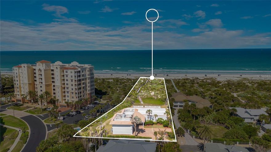 One or more photo(s) has been virtually staged. Welcome to Villa Valentina, your oceanfront experience like no other with timeless coastal luxury positioned on 1.5 acres of prime oceanfront land. Villa Valentina presents a rare and valuable opportunity with plenty of land to build an additional guest house or custom addition. This exceptional offering seamlessly blends immediate luxury living with future development potential, making it one of the most versatile and coveted properties in New Smyrna Beach, where you can enjoy coastal elegance today while creating your vision for tomorrow.
Nestled along the iconic and highly coveted North Beach shoreline, renowned for its world-class surf, this private estate stretches from Ocean Drive to the sand and surf. As the northernmost single-family oceanfront home before the inlet and dunes park, the property delivers exceptional privacy, panoramic Atlantic Ocean views, and a front-row seat to nature, including sea turtles nesting along the shore.
Your 5-bedroom, 6-bathroom residence with a 3-car side entry garage is designed for both luxury and entertaining. Inside, you will find open-concept living areas, recently renovated bathrooms, and a dedicated media room. The chef’s kitchen features stainless steel appliances, a natural gas stove, and elegant crown molding, flowing into a spacious living room complete with a wet bar.
Designed to feel like a private coastal resort, the home’s expansive patios, poolside setting, and venue-style layout make it ideal as a luxury residence, vacation retreat, or premier entertaining space. Expansive glass doors open to a covered, tiled porch with a full outdoor kitchen and built-in gas grill, creating seamless indoor-outdoor living. Multiple terraces, archways, and balconies capture breathtaking ocean views, while a 1,400-square-foot covered patio spans the length of the home, perfect for entertaining around your 36’ x 20’ saltwater pool and spa. The first floor offers approximately 3,000 square feet, including a full bedroom, 1.5 baths, and a striking double-sided fireplace separating the dining and living areas. Upstairs, 4 bedrooms each feature their own private bathrooms, the primary suite serves as a private retreat with its own oceanfront balcony, ideal for morning coffee or sunset views. The spa-like ensuite includes a double vanity, walk-in shower, and an expansive walk-in closet. Located in the heart of New Smyrna Beach, known as the surfing capital of Florida, you are just moments from world-class waves near the jetties, fishing at Ponce de Leon Inlet, the lagoon, and a vibrant coastal lifestyle filled with waterfront dining, boutique shopping, and local art. Whether you are expanding, investing, or simply enjoying oceanfront living at its finest, Villa Valentina offers a truly unmatched opportunity with NO HOA. Be sure to click on the virtual tour links.