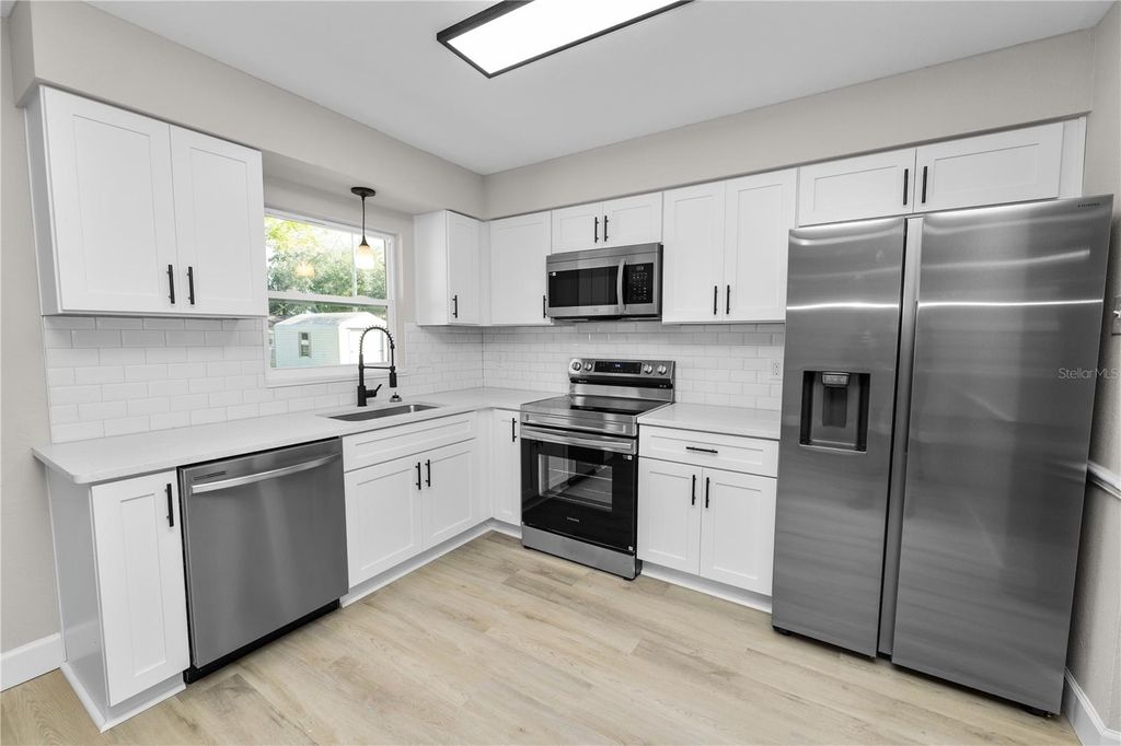 Photo of 1208 Blake Avenue, Auburndale, FL 33823 (MLS # L4958654)