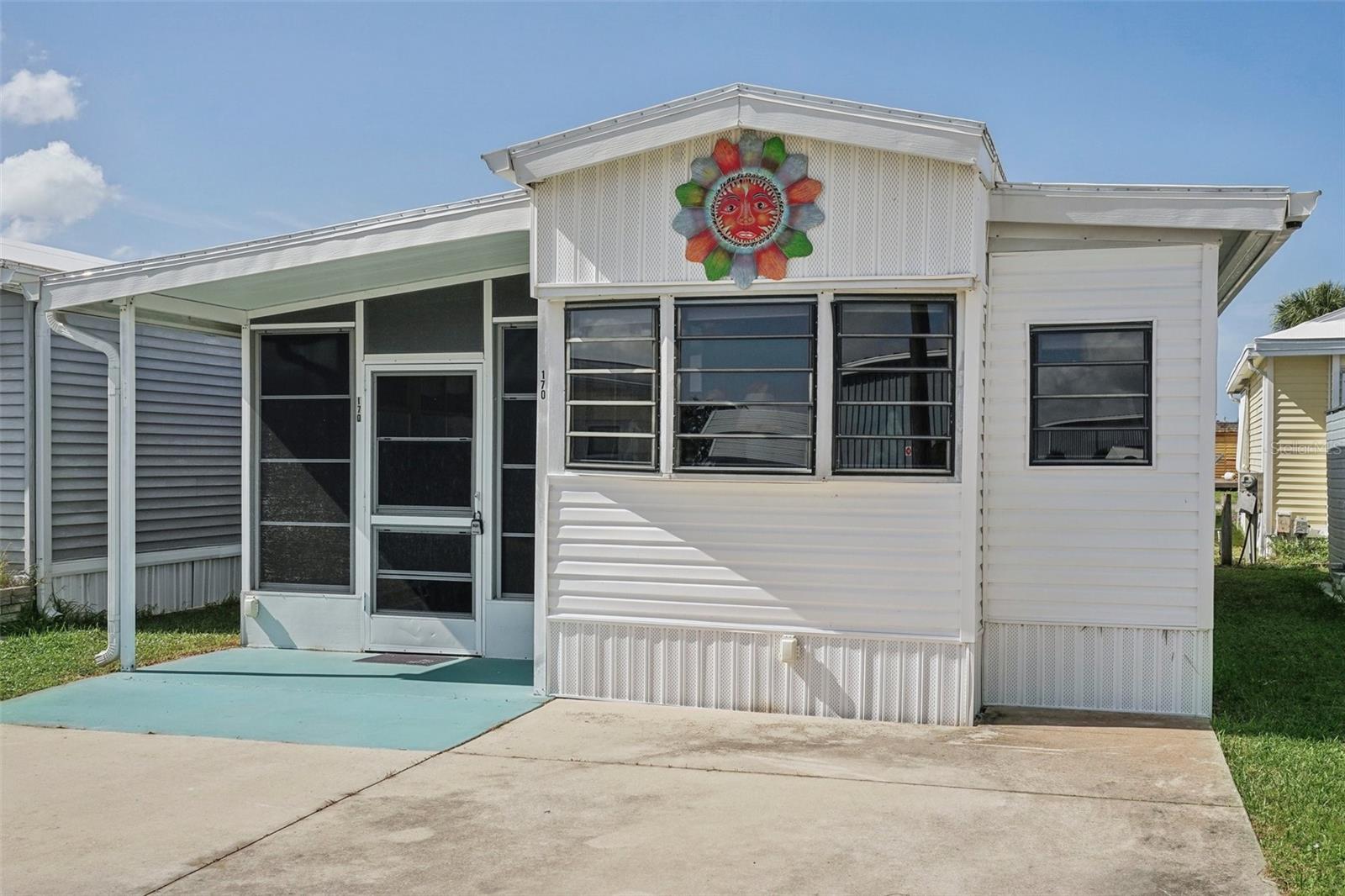 Welcome to 1475 Flamingo Dr #170—an adorable, land-owned mobile home in the heart of the highly desirable 55+ community of Holiday Travel Park in Englewood, FL. This furnished Florida snowbird retreat offers low-maintenance living just minutes from the Gulf Coast's stunning beaches.
With 400 square feet of cheerful and efficient living space, this 1-bedroom, 1-bathroom home is perfect as a seasonal getaway, downsized residence, or real estate investment. Step inside to discover updated vinyl flooring, cozy built-in cabinetry, and tasteful coastal-inspired decor that creates a warm, welcoming atmosphere.
The kitchen is fully equipped with appliances, abundant cabinet storage, and charming beachy accents. The private bedroom features generous storage, while the full bath includes updated finishes and built-in linen cabinetry for added convenience. The home also includes a stacked washer/dryer, storage shed, and sits on freshly leveled ground for peace of mind and long-term value.
Enjoy morning coffee or afternoon breezes from your screened-in lanai, adding extra living space to soak up the Florida sunshine. Best of all—you own the land and benefit from low HOA fees in a friendly, amenity-rich neighborhood.
Holiday Travel Park offers outstanding amenities for active adults, including a heated pool, clubhouse, recreational areas, and planned social events. This vibrant Englewood 55+ community is located just a short drive to Englewood Beach, Manasota Key, and historic Dearborn Street, plus you're close to shopping, dining, and daily conveniences.
Whether you're seeking a Florida snowbird home, a charming year-round space, or a smart investment near the beach, this land-owned mobile home in Englewood checks all the boxes. Don't miss out—schedule your private tour today!