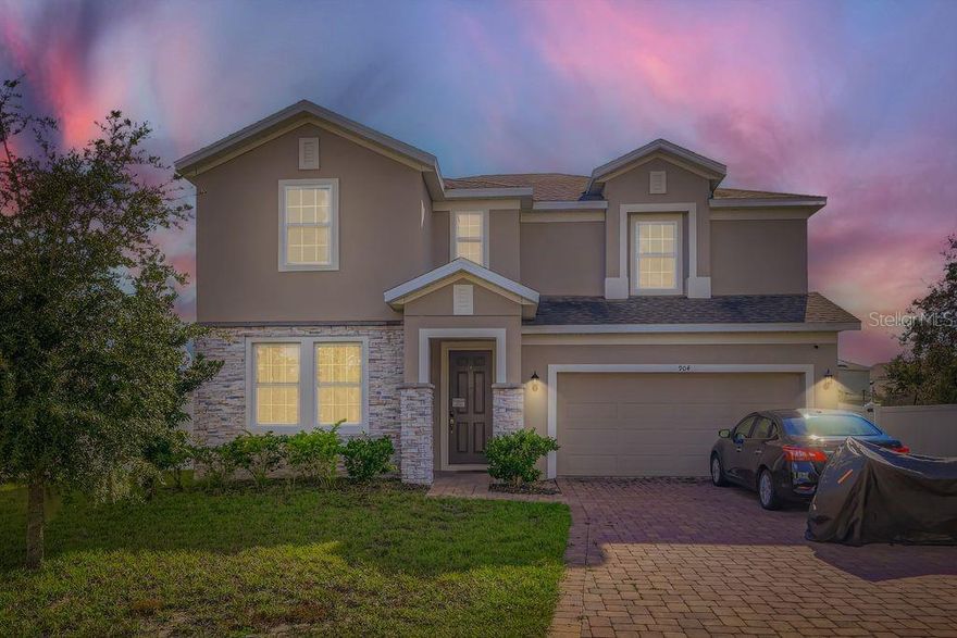 *** 2.25% Assumable VA Loan for qualified buyers ***  5 bedroom, 3.5 bath home on a LARGE LOT in the gated community of Williams Preserve, offering fantastic amenities for a LOW HOA. Stone accents and an 8’ front door give an elegant and inviting first impression. Just inside, a downstairs bedroom and full bath make the ideal guestroom – or use it for your HOME OFFICE or DEN. The open-concept floorplan is ideal for relaxing --- and for entertaining. The fabulous kitchen features a center island, white cabinets, and a walk-in pantry. The generously-sized living room offers even more space to spread out, while the back porch and LARGE, FENCED YARD provide desirable OUTDOOR LIVING areas where your family and friends can enjoy the Florida lifestyle. Upstairs there’s an additional family room –-- perfect for a playroom, game room or media room. The owner’s retreat offers a frameless shower with rain head, dual sinks and a large walk-in closet. A reverse osmosis water purification system adds to the home’s many features. The GATED community with a fabulous pool and playground provides a tremendous value for the LOW HOA fee. All conveniently located with shopping, dining and medical facilities minutes away. Excellent golf courses and the area’s top attractions are also nearby and there’s easy access to I-4, Hwy 27 and 17-92. Room dimensions are approximate: buyers should verify. Don’t let this one pass you by – schedule your showing today.
