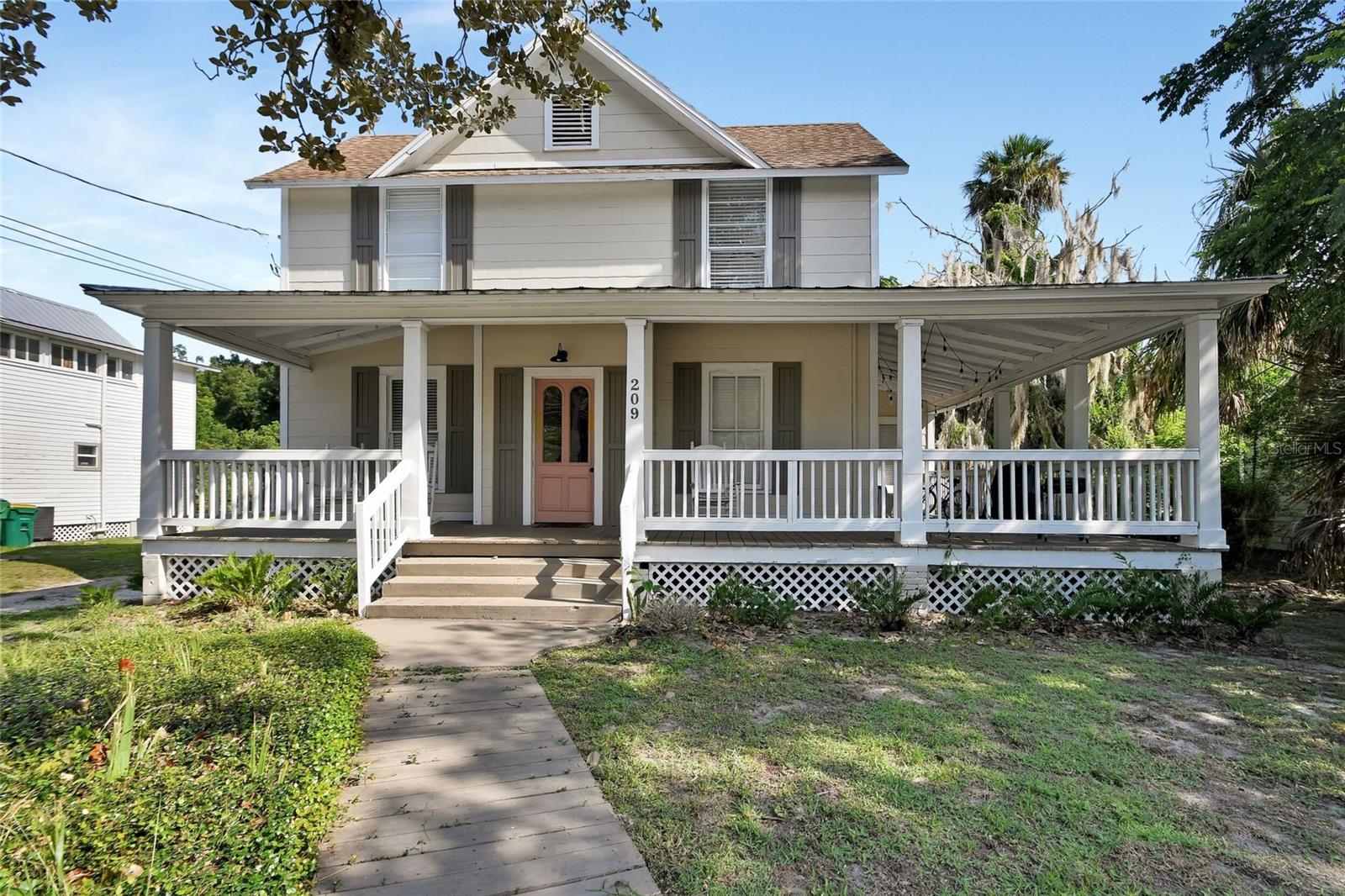 Great opportunity to own a beautiful, historic part of DeLand's past. Built in 1903 and currently separated into four rental units, two upstairs and two downstairs, including a common laundry available for all. A stones throw from DeLand's award-winning Downtown area, and Stetson University. Invest in your future or live, work and play in this beautiful house... the possibilities are endless.