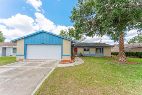 Photo of 10312 Lazy Lake Drive, Orlando, FL 32821 (MLS # O6406332)