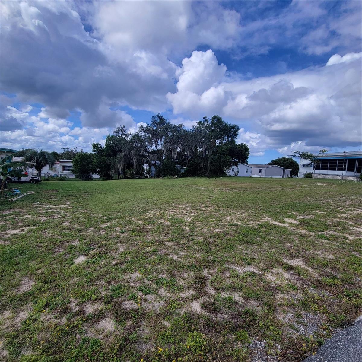 Take advantage of this fantastic opportunity to own a vacant lot in the highly sought-after 55+ gated golfing community of High Point. With low HOA fees, you’ll own the land outright, offering you the freedom to build your ideal home in a vibrant, active neighborhood. Enjoy a wealth of community amenities, including the golf course, community pool, clubhouse, tennis courts, bocce ball, and numerous social activities and events. High Point is conveniently located within minutes of SR-589, providing easy access to Tampa International Airport and just a short drive to Orlando. Whether you're looking to relax or stay active, High Point offers the perfect setting for your next chapter.