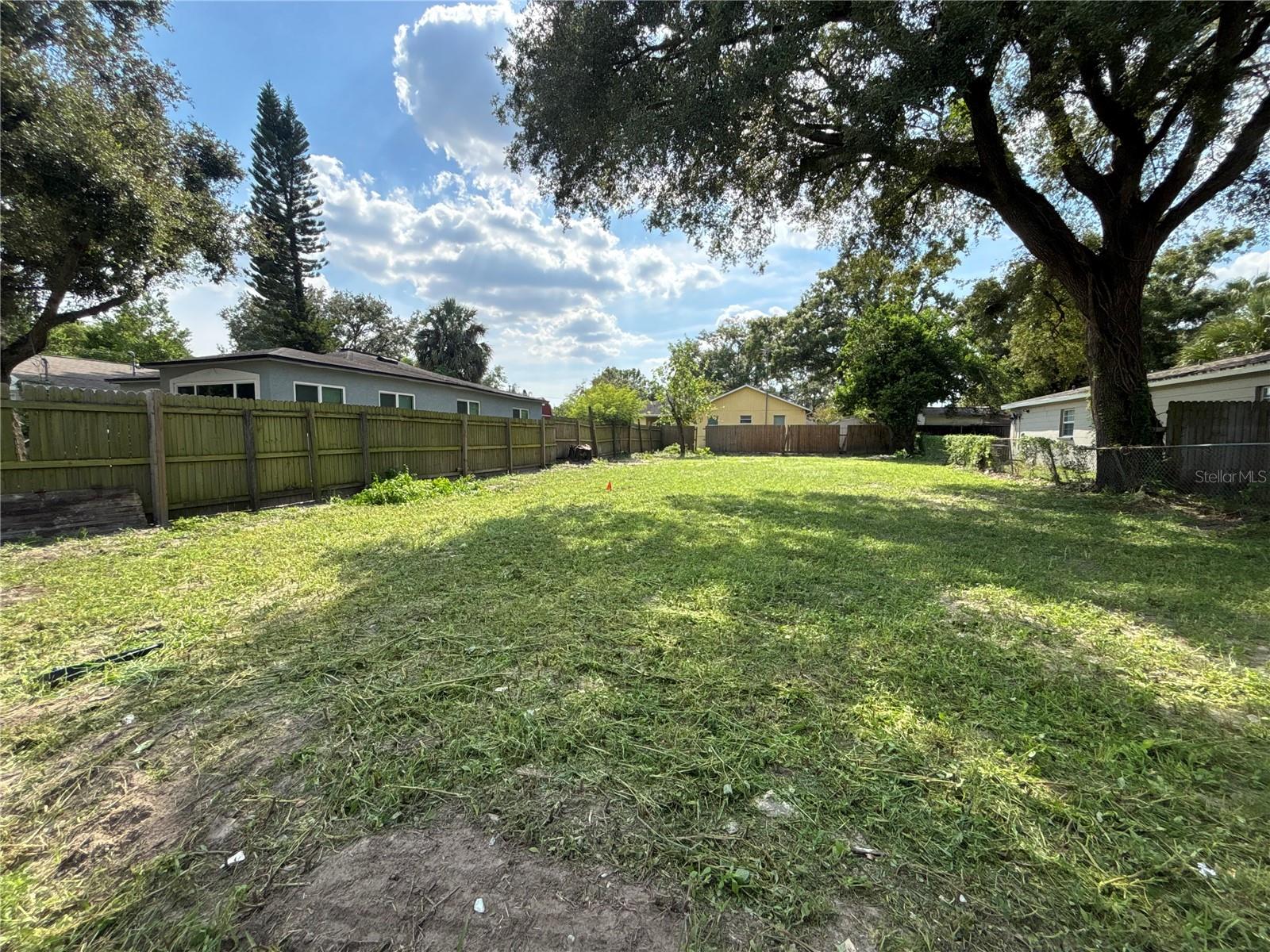 Welcome to 8418 N Elmer Street—a versatile vacant lot nestled in the heart of Tampa’s vibrant Oak Terrace neighborhood. With approximately 5,040 square feet of land and favorable residential zoning, this parcel offers endless potential for builders, investors, or homeowners looking to create something special. Whether you're envisioning a custom single-family residence or exploring redevelopment options, this property provides a rare chance to build in a well-established area with easy access to Downtown Tampa, Ybor City, and major highways. Utilities are connected, and the lot sits on a quiet street surrounded by mature trees and character homes. NO HOA/CDD. Dont miss out on this incredible opportunity.