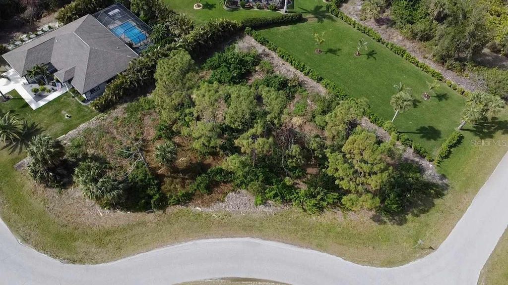 Photo of 125 Australian Drive, Rotonda West, FL 33947 (MLS # C7506033)