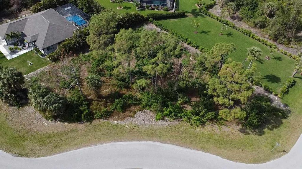 Photo of 125 Australian Drive, Rotonda West, FL 33947 (MLS # C7506033)