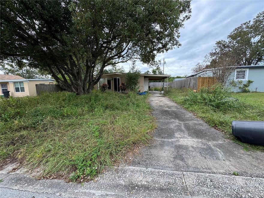 Single-story home offering 3 bedrooms and 2 bathrooms with a 1-car attached carport. Features include a double vanity in the bathroom and a wood-fenced backyard. Home needs TLC and is being sold as is, making it a great opportunity for renovation or investment.