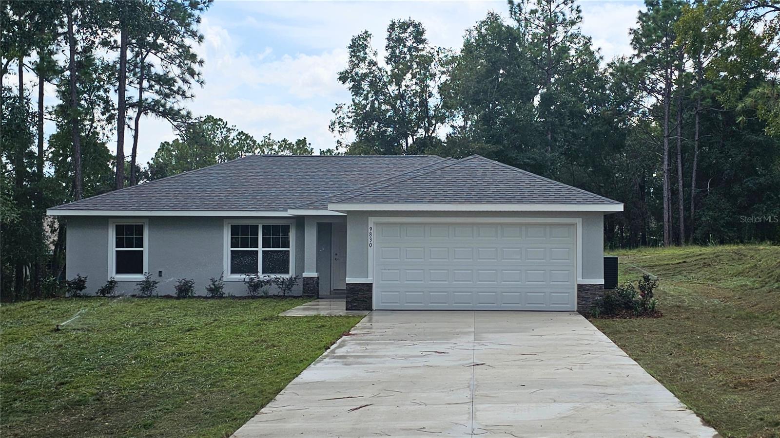 One or more photo(s) has been virtually staged. MOVE IN READY!! Beautiful new construction home in Rainbow Springs Country Club! Luxury Plank Vinyl flooring throughout all living and common areas, tile in bathrooms, and carpet in the bedrooms. 3 bedrooms, 2 bath, open floor plan with dining area and eat-in kitchen, all done in neutral, pleasing colors. Inside laundry with W & D hook-ups. Walk-in closet in Master bedroom. Stainless steel appliance package in the kitchen. Cabinets are white shaker-style with light luxury quartz countertops. Please see attached documents from Builder (Builders Contract Addendum & Warranty) Actual photos attached, plus virtually staged model home photos for reference. Any photos depicted are for illustration purposes only and only to show layout.