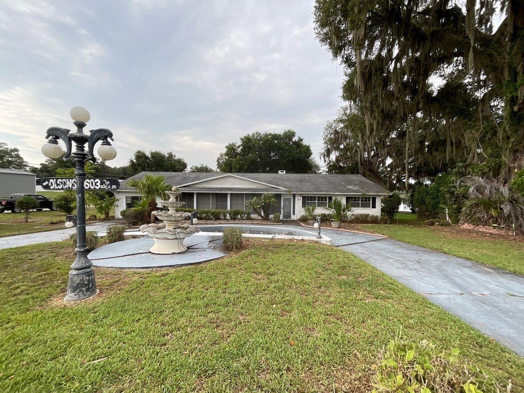 Photo of 603 W Ocala Street, Umatilla, FL 32784 (MLS # O6430745)