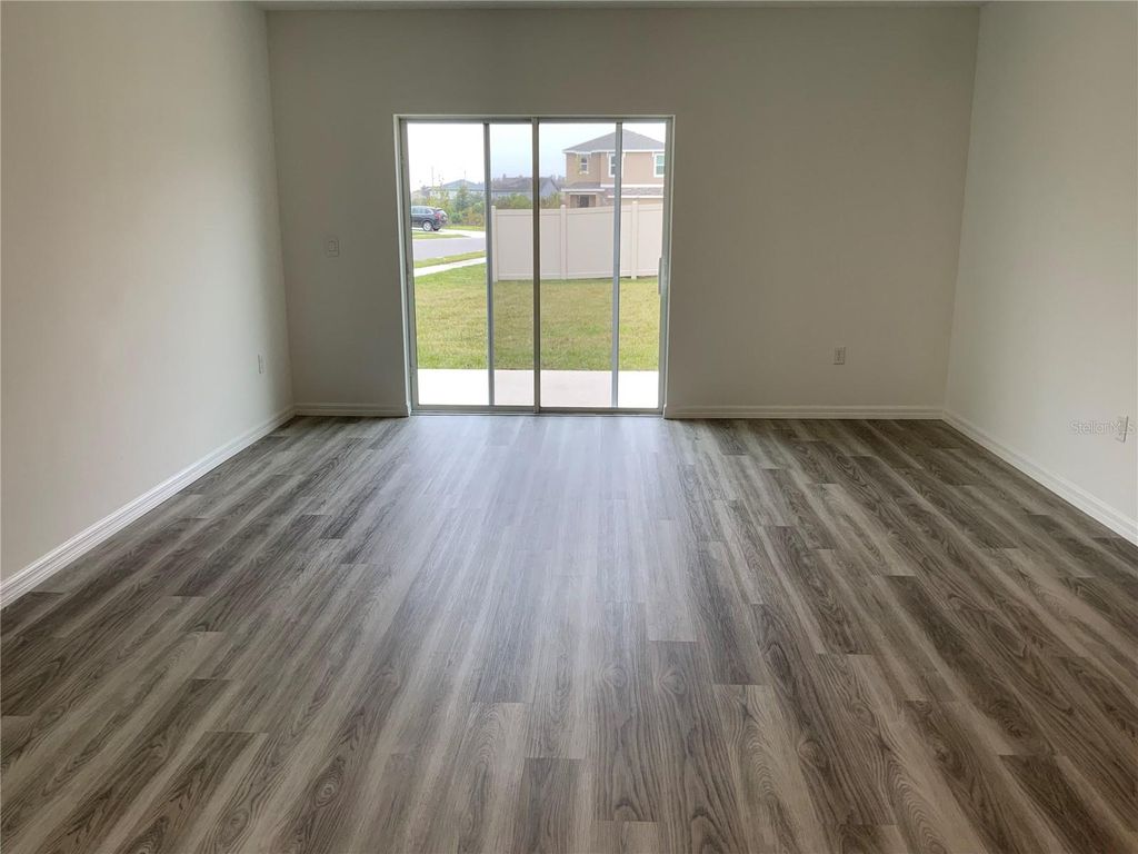 Photo of 32386 Evening Grove Ct, Wesley Chapel, FL 33543 (MLS # TB8455728)