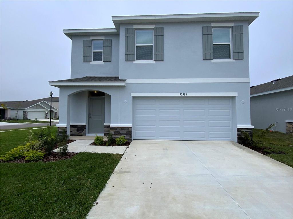 Photo of 32386 Evening Grove Ct, Wesley Chapel, FL 33543 (MLS # TB8455728)