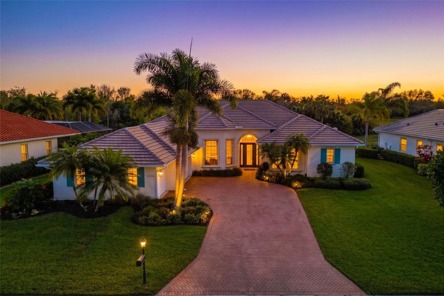 Rarely available and completely reimagined, this original-owner home has been renovated to a level rarely seen at any price point. Everything is updated, and the home is completely move in ready!  From the new roof and brick paver driveway to the striking extra-wide premium front door, every detail sets the tone. All windows and exterior doors throughout the home have been replaced with hurricane-rated impact glass, offering both peace of mind and energy efficiency.

Inside, soaring ceilings and oversized luxury tile define the great room, accented by custom built-ins and a gas fireplace. New hurricane-rated pocketing sliders open the home seamlessly to a travertine pool deck with heated pool and spa. The fully equipped outdoor kitchen features a beverage cooler and gas stainless grill, all overlooking private water and preserve views.

The kitchen is the showpiece—custom eucalyptus wood cabinetry, gas cooktop, Sub-Zero built-in refrigerator, French door wall oven, and built-in microwave. Granite and wood countertops,  This is a truly top of the line fully custom kitchen - dare to compare this level of finish. 

The primary suite offers wood floors and generous closet space complete with California closet built ins.  The spa-inspired bath showcases a freestanding tub, walk-in shower, vessel sinks,  unique underlit counters, and refined cabinetry.

A large den works perfectly as a home office. Two guest suites and baths provide privacy for family or visitors. Solid wood interior doors, extensive art lighting, premium fixtures, a three-car garage, and a whole-house generator complete the package.

All of this in Waterlefe Golf & River Club, where you truly live like you’re on vacation. Few communities offer the rare combination of boating access to the Manatee River and Gulf beyond, championship golf, and an active River Club with amenities and activities for everyone. HOA fees include 24-hour access to a state-of-the-art fitness center, fine dining, tiki bar, heated resort-style pool, plus cable and internet. Boat in the morning, tee it up in the afternoon, and meet friends at the club in the evening.

Be sure to explore the 3D tour by clicking the virtual tour button.