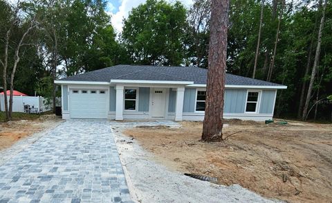 Photo of 68 Dogwood Loop, Ocala, FL 34472 (MLS # OM721805)
