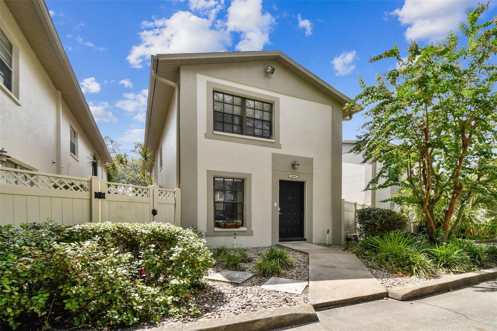 Live in the heart of Hyde Park—just steps from Bayshore Boulevard, Hyde Park Village, The University of Tampa, and South Tampa’s top dining. This updated two-story, fee-simple townhome offers 1,008 sq ft of low-maintenance living.
The main level features tile floors, a renovated kitchen with stone counters, stainless appliances, pantry, half bath, and full-size washer/dryer. Upstairs, two bedrooms with luxury vinyl plank floors share an upgraded bath with modern finishes.
Enjoy a private deck and fenced garden, perfect for relaxing or entertaining, top-rated Gorrie, Wilson, and Plant schools nearby. Move-in ready and close to shopping, dining, and waterfront recreation!
