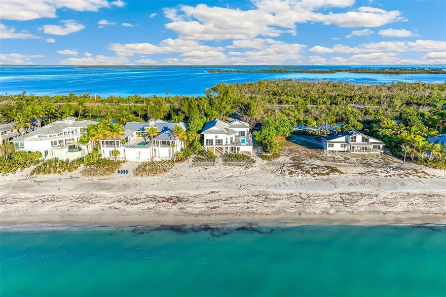 This elevated beachfront residence offers 105 feet of unobstructed Gulf frontage on a private lane with quick access to Boca Grande’s charming village. Expansive impact glass sliding doors open to the water views and illuminate the open living area, while the galley kitchen overlooks the pool and outdoor spaces. The primary suite features floor-to-ceiling doors, a small private office, and an ensuite bath. The two guest rooms feature large closets and full baths. Outside, the private pool and sun deck create a sunny retreat. Just a short golf cart ride away, enjoy Boca Grande’s boutiques, dining, and the historic Gasparilla Inn. Sold furnished, this beachfront property delivers the beachfront, island lifestyle.