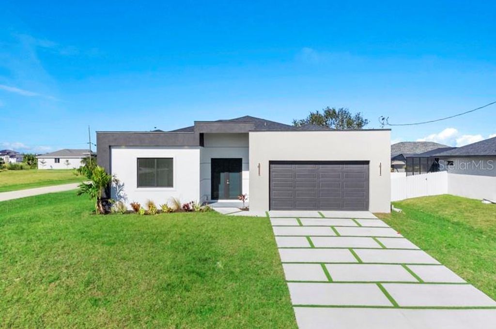 Photo of 3927 NW 38th Street, Cape Coral, FL 33993 (MLS # O6402672)