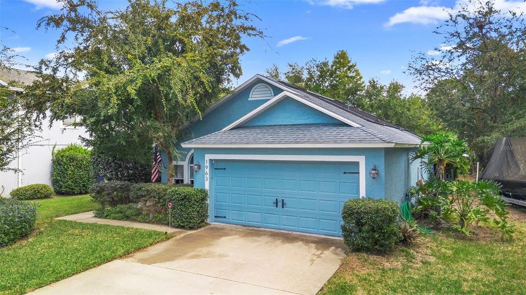 Photo of 1963 Marsh Hen Village, Deland, FL 32720 (MLS # V4945774)