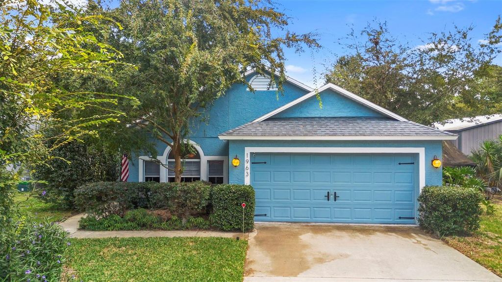 Photo of 1963 Marsh Hen Village, Deland, FL 32720 (MLS # V4945774)