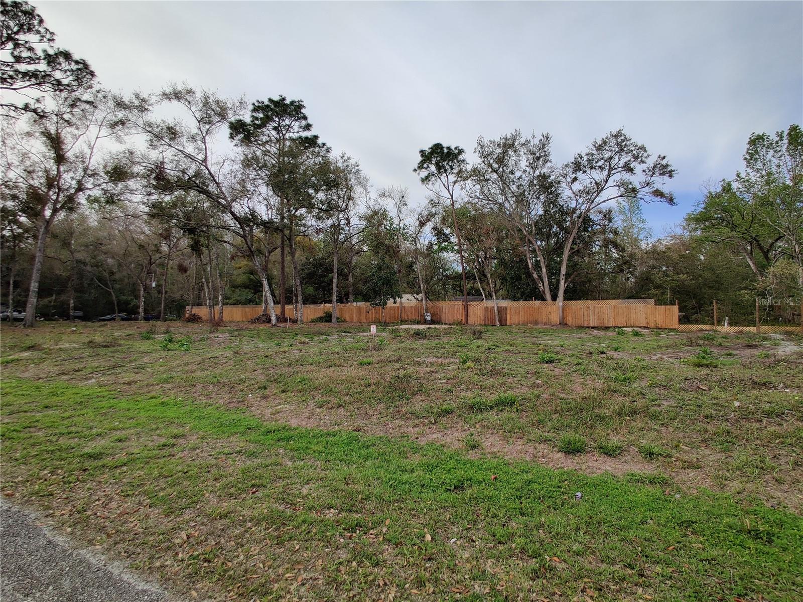 This is the only cleared lot available in Moon Lake Estates! Do not miss this opportunity to own land in Florida. Close to a third of an acre, non-flood zone in an area of much development potential. New subdivisions going up nearby. Only 7 minute drive to the Suncoast Parkway; 15 minutes to multiple marinas; 10 minutes to Starkey Wilderness Preserve where you can hike, camp, or bike through more than 8000 acres of beautiful Florida wilderness; and 30-minute drive to Downtown Tampa or Tampa International Airport This lot is zoned for single family residential or modular home. Build your new home on this affordable lot!