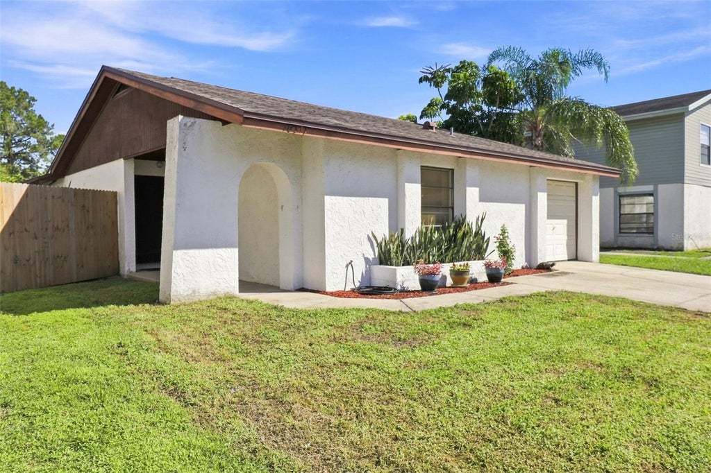 Photo of 10311 Chadbourne Drive, Tampa, FL 33624 (MLS # TB8544746)