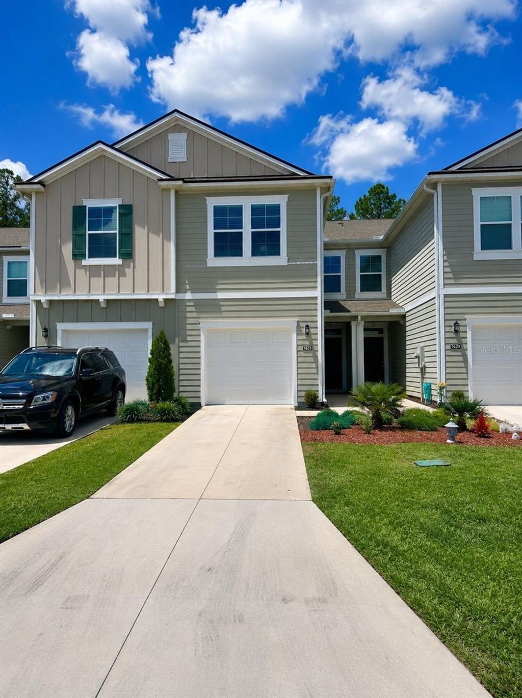 Photo of 339 Redbud Road, Palm Coast, FL 32137 (MLS # FC318854)