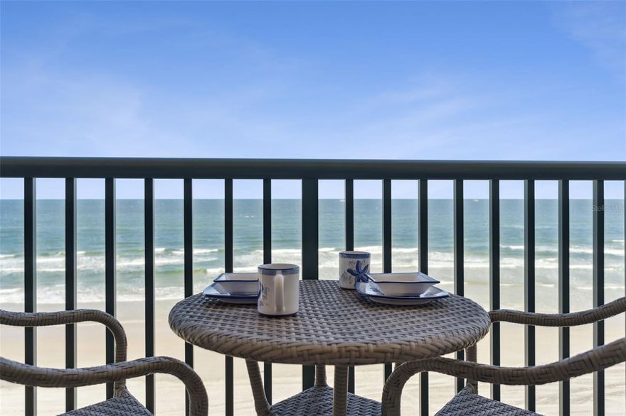 Discover coastal luxury living on the fifth floor of Tower 8 at The Towers at Ponce Inlet. This spectacular two-bedroom, two-bath oceanfront residence includes an office nook with built-in bookshelves and an enclosed lanai offering flexible living space, ideal for a den, morning coffee retreat or sunset relaxation. The heart of the home is a large kitchen with extended counter space and a breakfast bar, seamlessly flowing into the open family and dining area. Go out onto your private balcony, accessible from the main bedroom and family room, and take in refreshing ocean breezes and breathtaking sunrises over the Atlantic Ocean. The main suite features a garden tub and separate shower, while the guest bedroom is conveniently adjacent to the hall bath. A spacious laundry room with wall cabinets and a front storage area for beach gear ensures easy organization. Recent upgrades include a new $14,000 HVAC system and luxury vinyl plank flooring. Residents of Tower 8 enjoy resort-style amenities: a clubhouse, oceanfront pool and spa, fitness center, secure key entry, and underground parking. Pets are welcome (up to two), short-term rentals are allowed (one-month minimum), and electric storm shutters offer peace of mind. Set along the No Drive section of the pristine Ponce Inlet beach, this peaceful location is just moments from iconic Ponce Inlet Lighthouse, scenic jetty and dog-friendly beach. Savor coastal dining at local favorites like Down the Hatch and Hidden Treasure Rum Bar & Grill, or explore the 41-acre Ponce Preserve, offering walking trails, kayaking, fishing, and glimpses of Old Florida’s natural beauty. Close to championship golf at LPGA International and Cypress Head, and only a short drive to Daytona International Speedway, this residence perfectly blends luxury, leisure and location. Furniture negotiable. Welcome to your oceanfront oasis!