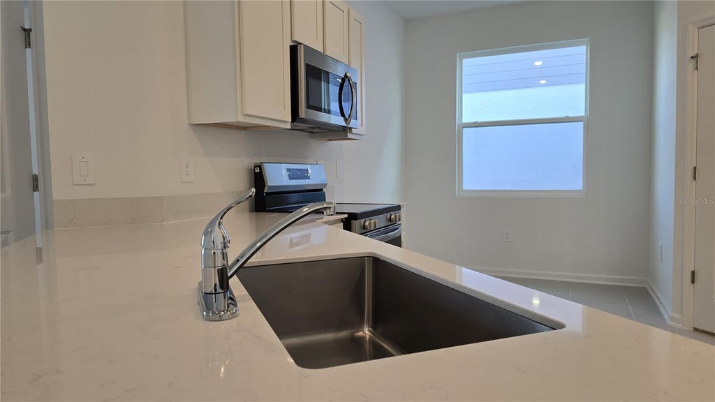 Photo of 4822 Katrina Drive, Haines City, FL 33844 (MLS # O6446041)