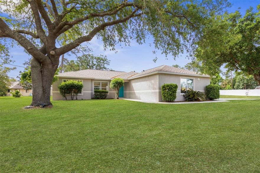 This beautiful 3 bedroom 2 bath homes sets on an oversized lot with mature landscaping and plenty of room to add a pool.
Tile throughout gives this home a sleek clean look.  The primary bedroom has on en-suite bathroom and walk-in closet.   The floor plan has an open dining room/great room area that makes the home feel welcoming. Located minutes from local beaches, golf courses, European Village dining, and nearby shopping. Whether you’re seeking a full-time residence or a vacation retreat, 129 Bayside Drive delivers!