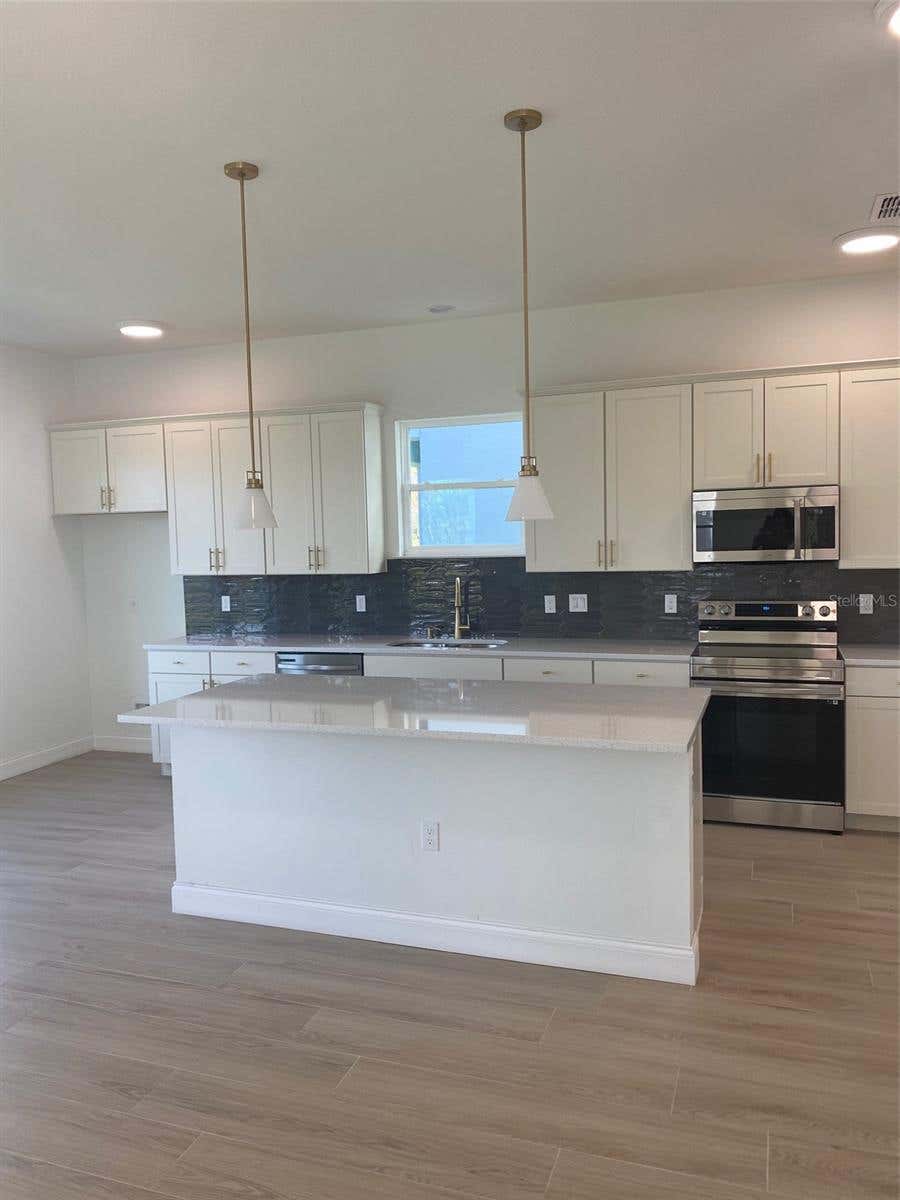 Photo of 754 Reflection Lake Drive, Orlando, FL 32807 (MLS # O6420086)