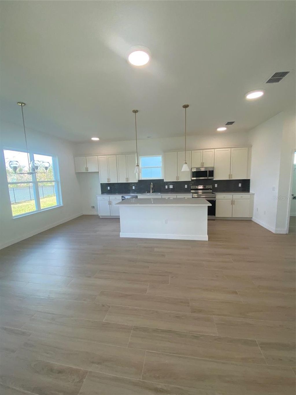 Photo of 754 Reflection Lake Drive, Orlando, FL 32807 (MLS # O6420086)