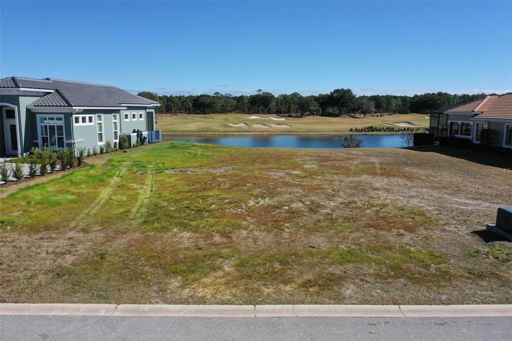 Photo of 423 Bourganville Drive, Palm Coast, FL 32137 (MLS # FC315662)