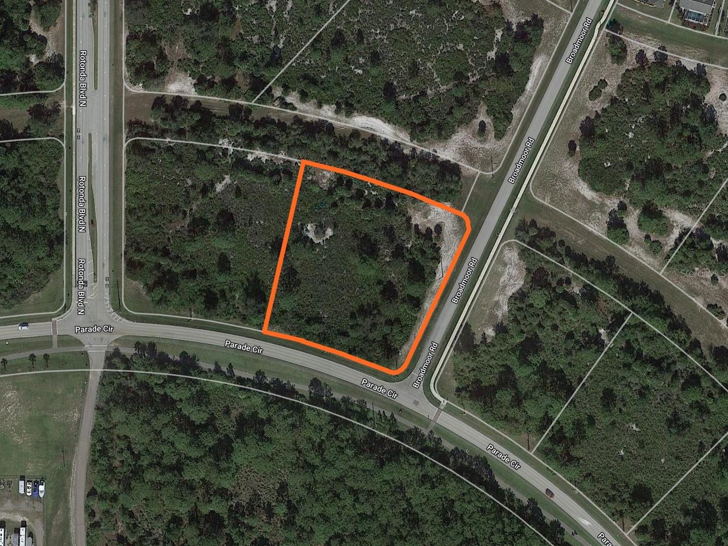 Location, location, location! Look at this beautiful piece of vacant land in the very center of Rotonda West. The preferred X flood zone will save thousands in building costs and ongoing insurance costs! This lot is favorably zoned OMI which has many commercial uses like Office, Medical, and Institutional as well as residential uses like Multi-Family and Single Family. If you choose to use the conditional zoning option of Multi-Family the density can be up to 10 units per acre. For this 1.9-acre parcel, you could theoretically put 19 units on it. Or you could build one magnificent home on a huge 1.9-acre lot. The choice is yours, commercial or residential. All utilities are here including water, sewer, cable, broadband internet, electric, and phone. Other lots are available on Parade Circle from the same seller if you would like to purchase several as a package. Seller financing is available.