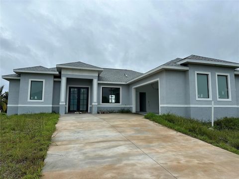 Photo of 10658 Rainsville Street, Port Charlotte, FL 33981 (MLS # TB8343452)