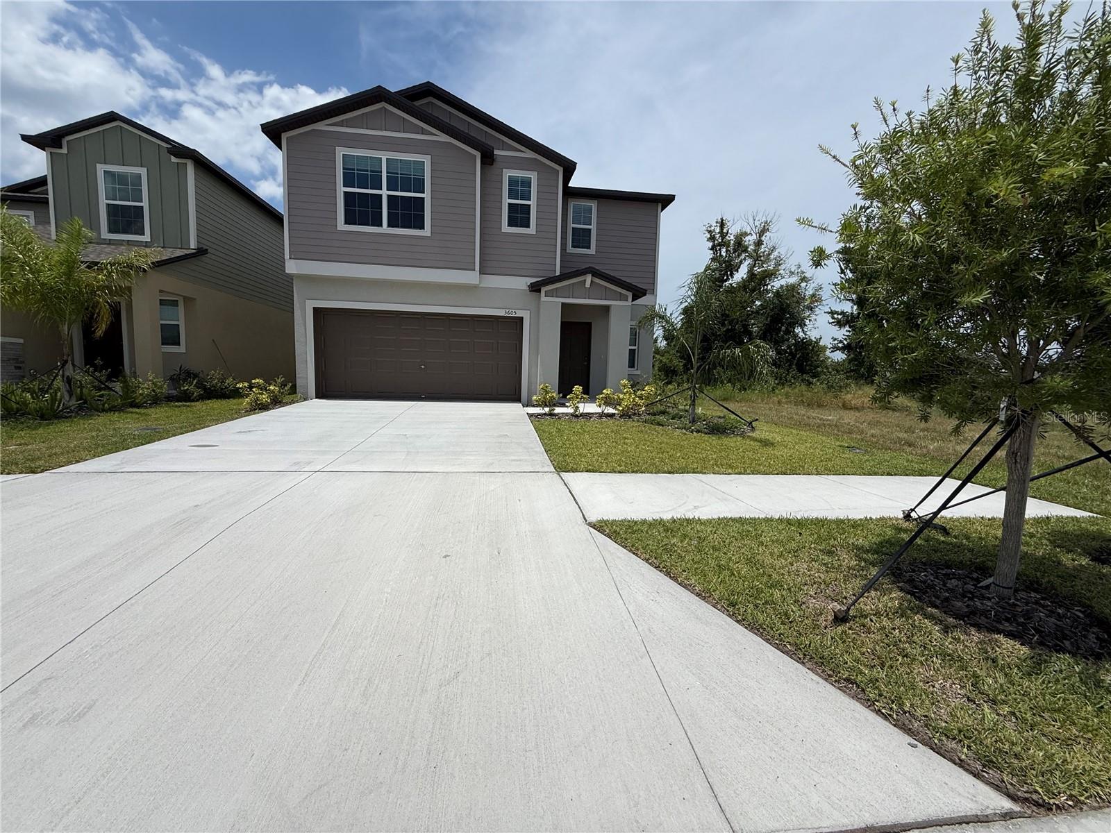Welcome to 3605 Great Park Court — a rare **six-bedroom, three-bathroom beauty** tucked into a quiet cul-de-sac in Plant City! This expansive two-story home offers the perfect blend of functionality, comfort, and modern charm — ideal for multi-generational living, growing families, or those who love extra space. Downstairs, you'll find a bright and open living area that flows seamlessly into a gourmet kitchen featuring granite countertops, stainless steel appliances, a center island with bar seating, and a large pantry. The first floor also includes one bedroom and a full bathroom, offering a flexible layout perfect for guests, a home office, or an in-law suite.
Upstairs, retreat to the spacious owner’s suite, complete with a luxurious ensuite bath that boasts a soaking tub, separate glass-enclosed shower, dual sinks, and a massive walk-in closet. You'll also find four additional bedrooms, a third full bathroom with dual sinks, and a large bonus/flex space — ideal for a media room, playroom, or teen hangout.
Outside, is ready for entertaining with a covered lanai and plenty of space to admire the bald eagles and calm pond view. Located minutes from downtown Plant City, parks, dining, and commuter routes, this move-in ready home offers space, versatility, and a layout designed for real life. 3605 Great Park Court isn’t just a home — it’s a lifestyle upgrade.
