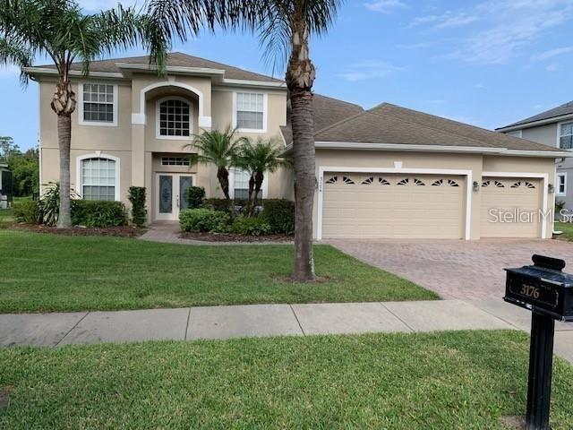 This spacious home features 5 bedrooms, 4 baths, a huge bonus room that was closed in and converted to a theater room with built in speakers, projector, 100+ inch screen and more. Family room also set up with surround sound. An upgraded kitchen with built-ins and much more. Lots of living space, large screened patio overlooks pond. Located in a gated community close to schools, shopping, major highways, hospitals, Downtown Winter Garden and parks.