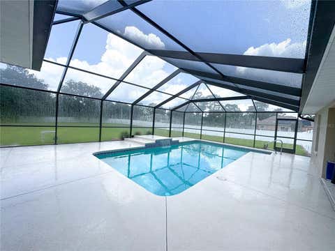 Tiny photo for 6282 NE 61st Avenue Road, Silver Springs, FL 34488 (MLS # OM705057)