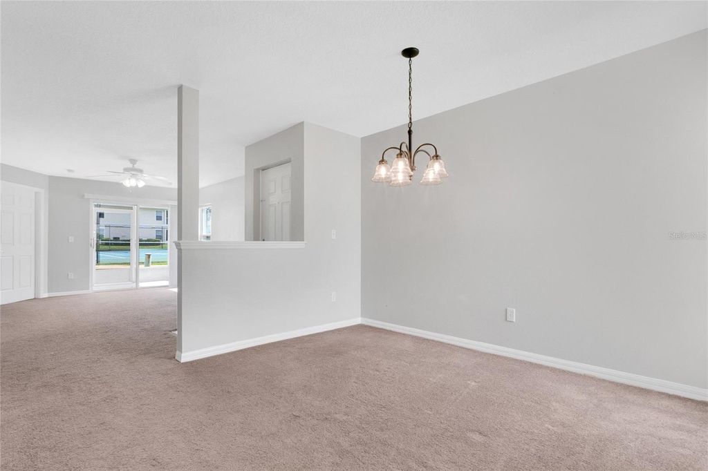 Photo of 8810 Grand Palms Circle #A, Kissimmee, FL 34747 (MLS # O6410146)
