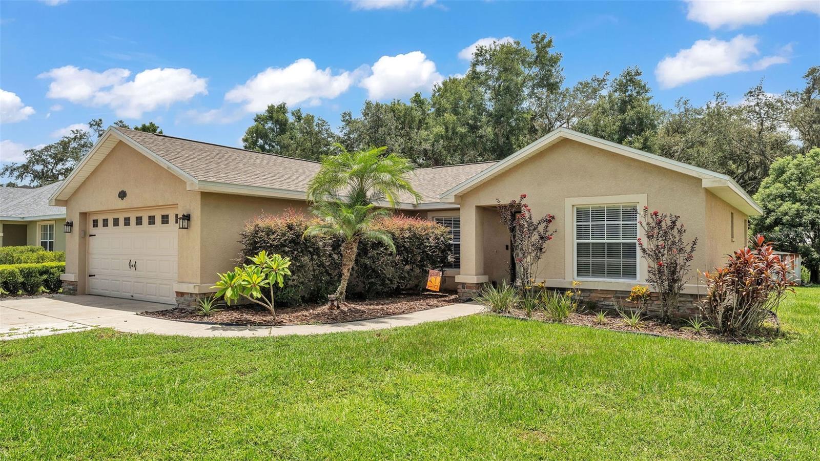 Welcome to 4651 Clubhouse Rd in South Lakeland, tucked away at the end of Clubhouse Road in South Lakeland, this charming custom Hulbert home offers the perfect blend of peaceful country living and city convenience. Just minutes from shopping, dining, and major roadways, you’ll enjoy the best of both worlds.
The home shines with vaulted ceilings and an open floor plan create a spacious, airy feel. Luxury vinyl flooring throughout for style and durability. Walk into your cook’s dream kitchen with custom wood cabinetry, granite countertops, large island with seating, and ample counter space. All appliances and roof replaced within the last 3 years to give you peace of mind. The home features a split-bedroom layout for added privacy. Not only is does the home have a larger than normal residential HVAC unit, but it also contains a mini-split system in the garage for year-round comfort. The outside is just a breathtaking as the inside! The expansive backyard (almost 1/4 of an acre) borders a wooded area for added privacy.
As you step outside the screened-in back porch for relaxing evenings, you will see a farmhouse-style fire pit perfect for cozy gatherings. To top it off the property has a detached shed for extra storage or hobby space.
Located near US-98 and the Polk Parkway for easy commuting