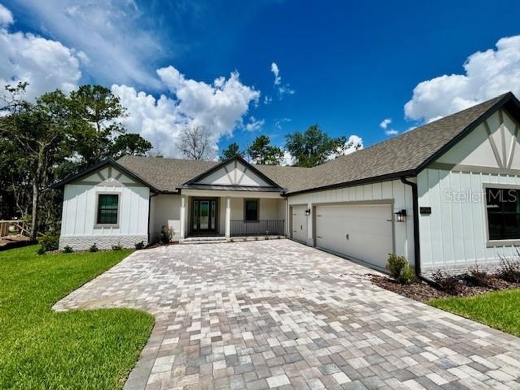 Photo of 4799 Hickory Oak Loop, Brooksville, FL 34601 (MLS # TB8394373)