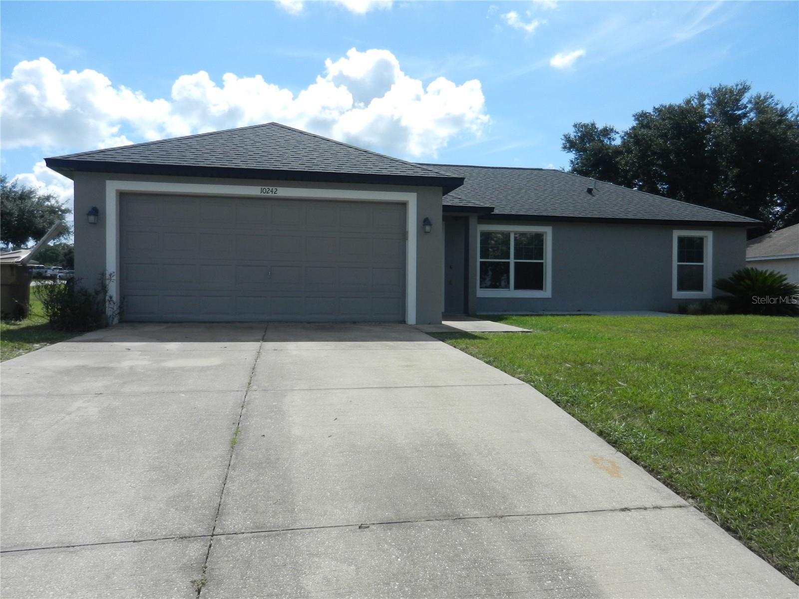 3 Bedroom 2 Bath home, ceramic tile throughout and in great shape. 2 car garage, high and dry lot.