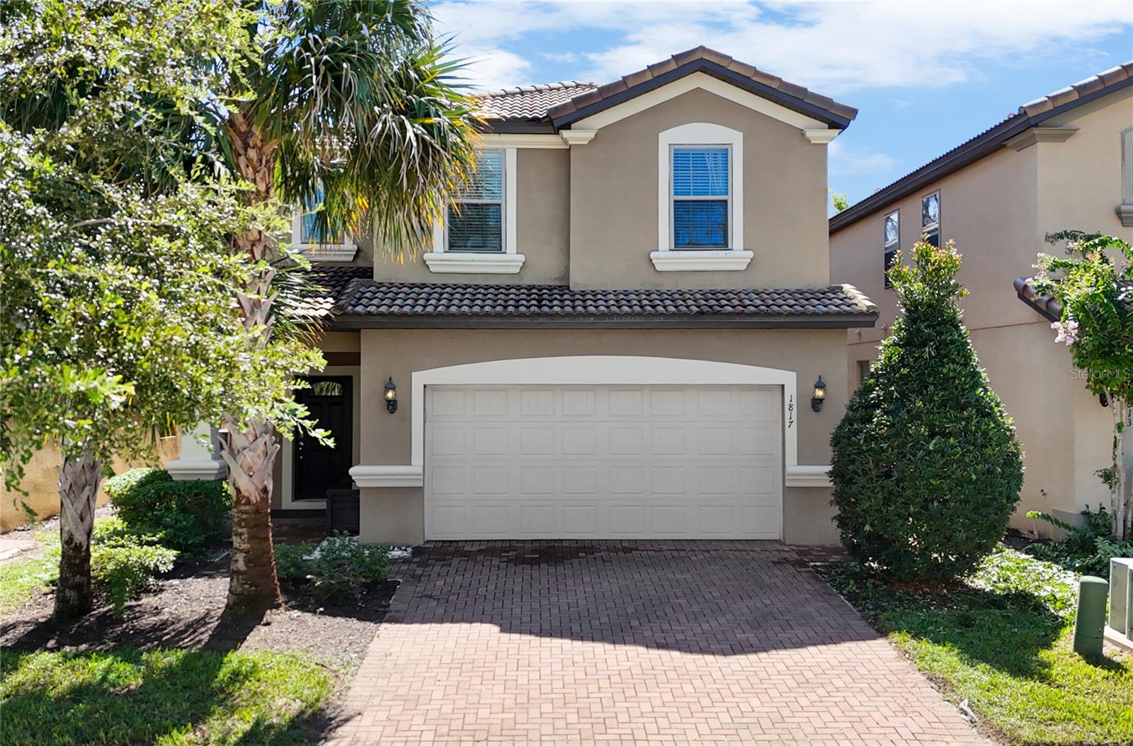 Welcome to this stunning 6-bedroom, 4.5-bathroom pool home located in the sought-after Windsor at Westside Resort. Fully furnished and move-in ready, this home offers a luxurious and comfortable retreat for vacationers or permanent residents alike.
As you arrive, you'll be greeted by mature landscaping, a brick-paver driveway, and impressive curb appeal. Inside, the home features a spacious open floor plan with a modern kitchen boasting cappuccino cabinets, granite countertops, stainless steel appliances, and ample counter space.
The downstairs primary suite offers a peaceful escape with a large walk-in closet and a luxurious bathroom complete with a garden tub, walk-in glass shower, dual vanities, and granite countertops. Custom drapes flow throughout the home, and the main living area is enhanced by large sliding glass doors that lead out to the covered lanai, screened pool and spa, all with no rear neighbors for added privacy.
Upstairs, you'll find a spacious loft complete with a pool table and additional seating area—perfect for entertaining. There are two large bedrooms at the rear that share a Jack-and-Jill style bathroom with double sinks and a tub/shower combo. An additional pair of bedrooms share a bathroom with a glass walk-in shower. The upstairs primary suite features a generous closet and its own ensuite bathroom with walk-in shower and dual vanities.
Additional highlights include a 2-car garage for extra storage or parking and a covered lanai ideal for outdoor dining and lounging by the pool.
Windsor at Westside is a premier resort-style community offering a 10,000 sq. ft. clubhouse, lake and pier, zero-entry resort-style pool with waterslide, lazy river, and a kids' splash zone. Enjoy dining at the Tu Casa Tiki Bar, unwind by the outdoor fireplace lounge, or stay active with the fitness center, volleyball courts, and more. A sundry shop and video arcade add to the fun for all ages.
Conveniently located near major roads with easy access to Disney World® via toll road 429, this home is perfect as a vacation home, or short-term rental investment.